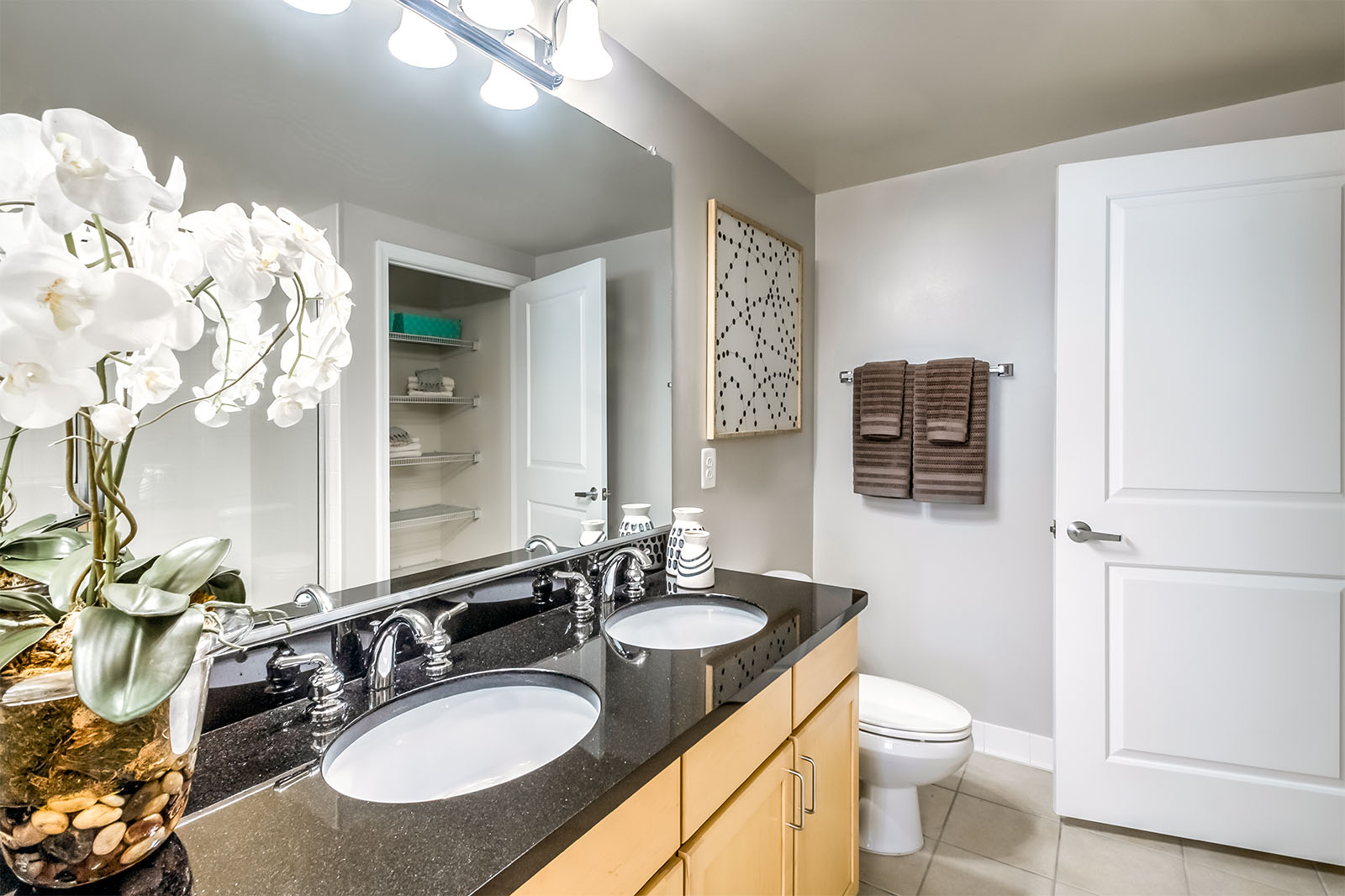 Pristine baths with double sinks in select apartment homes.